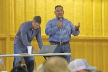 (KYLIE BAILEY | THE GRAHAM LEADER) Texas Energy Consultants President Robert Peña (right) and Titus LCV Senior Director of Engineering Micah Nichols (left) met with the community Wednesday, Nov. 5 to hear concerns and answer questions regarding a solar and battery storage project.  