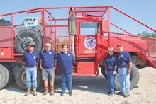 (TC GORDON | THE GRAHAM LEADER) Members of the Murray Volunteer Fire Department pose in front of one of the trucks in their fleet. Pictured from left to right are JD Bruton, Bill Sturgis, Autumn Sturgis, Cookee Johnson and Arwin Johnson. The VFD will host its annual barbecue and auction fundraiser at 5:30 p.m. Saturday, Oct. 5.