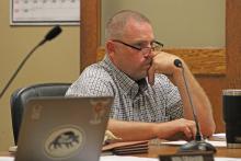 (ALEX HAVARDANSKY | THE GRAHAM LEADER) Young County Commissioner Scott Shook listens to public comments at the commissioners court meeting Monday, June 2.