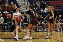 (ALEX HAVARDANSKY | THE GRAHAM LEADER) Katy McGehee drives past multiple defenders to get to the basket Thursday, Nov. 20 against the Bowie Ladyrabbits. McGehee helped lead the way in the fourth quarter comeback against the Bowie Lady Rabbits.