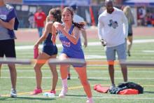 (ALEX HAVARDANSKY | THE GRAHAM LEADER) Emerie Stogner takes off in a high jump heat at the area meet Friday, April 11 in Abilene.