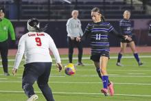 (THOMAS WALLNER | THE GRAHAM LEADER) Marisa Bueno passes the ball up the field during the rematch of the Lady Blues and Mineral Wells Lady Rams held Tuesday, March 4.
