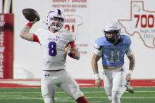 (ALEX HAVARDANSKY | THE GRAHAM LEADER) Jace Gill throws a pass Friday, Nov. 28 in the regional semifinal round of the playoffs. The football team will be one of several teams honored at the fall sports banquet for Graham. 