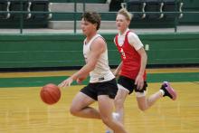 (ALEX HAVARDANSKY | THE GRAHAM LEADER) Cooper Corley races down court for a transition layup Tuesday, June 3 against the Albany Lions. Corley clinched the game after sinking a clutch free throw to pick up a 33-32 Steers win.
