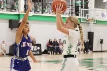 (ALEX HAVARDANSKY | THE GRAHAM LEADER) Allison Melton looks to pass the ball to a teammate in one of the Ladycats’ previous matchups. The Ladycats participated in a basketball tournament in Whiteface against four teams from Thursday, Dec. 4 to Saturday Dec. 6. 