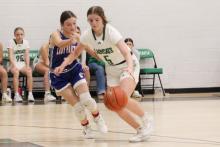 (ALEX HAVARDANSKY | THE GRAHAM LEADER) Kinzlee Sweat drives past a defender in one of the Ladycats’ previous matchups. 