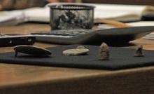 (ALEX HAVARDANSKY | THE GRAHAM LEADER) Multiple artifacts were uncovered from Fort Belknap and shown to the commissioners court at their meeting Monday, June 9. Items included the breast plate of a cartridge box and the button for the sleeve of a medical pack.