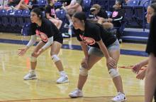(ALEX HAVARDANSKY | THE GRAHAM LEADER) ALEX HAVARDANSKY | THE GRAHAM LEADER Several members of the Newcastle Ladycats stand ready on defense Monday, June 9. The Ladycats opened their schedule Monday against the Perrin-Whitt Pirates. 