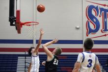 (ALEX HAVARDANSKY | THE GRAHAM LEADER) Brodie Martin goes up to block a shot in one of the Steers’ previous matchups. Martin scored four points in the team’s win against Burkburnett in the Hays Christmas Classic tournament from Monday, Dec. 29 to Wednesday, Dec. 31. 