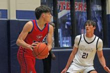 (ALEX HAVARDANSKY | THE GRAHAM LEADER) Brodie Martin looks to drive past a defender in one of the Steers’ previous matchups. Martin was one of two leading scorers for Graham with 11 points Tuesday, Jan. 6 in a 48-47 win for the Steers over the Childress Bobcats. 