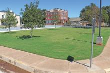 (THOMAS WALLNER | THE GRAHAM LEADER) A lot located inside the Graham downtown square at the corner of Second and Oak Street that was accepted by the city of Graham as a donation. The location is being considered for a downtown food truck park.