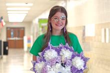 (THOMAS WALLNER | THE GRAHAM LEADER) Newcastle senior Ashleigh Taylor poses for a photo while showing her school spirit for homecoming which was Friday, Sept. 27. Along with numerous other achievements, Taylor recently received the news she made a perfect score on the math portion of the ACT.