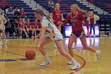 (ALEX HAVARDANSKY | THE GRAHAM LEADER) Katy McGehee drives past a defender in one of the Lady Blues previous matchups. McGehee returned from injury Friday, Dec. 19 against the Ballinger Lady Cats and scored on a two point bucket.