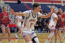 (ALEX HAVARDANSKY | THE GRAHAM LEADER) Tara Dawson plays up on defense Tuesday, Dec. 16 against the Memorial Lady Mavericks. Dawson scored six points in the Lady Blues 52-41 win over the Lady Mavericks. 
