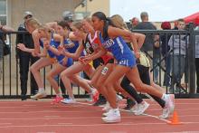 (THOMAS WALLNER | THE GRAHAM LEADER) Angela Fuentes takes off with other participants in the 800 Meter Run at the PK Relays held Saturday, March 15 in Graham. Fuentes competed in both the 800 Meter Run and the 1600 Meter Run events.