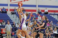 (THOMAS WALLNER | THE GRAHAM LEADER) Katelyn McGeehee takes flight to attempt a  2-point shot  for the Lady Blues in their Tuesday, Jan. 7 matchup against the Stephenville Honeybees. McGeehee was one of the top scorers for the team during the game which ended in a 57-31 loss.