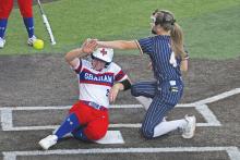 (ALEX HAVARDANSKY | THE GRAHAM LEADER) Ruby Shaffer slides into home after a wild pitch in the sixth inning Tuesday, March 19 against Stephenville. The Lady Blues opened district with a 5-4 at home.