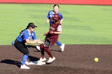 (ALEX HAVARDANSKY | THE GRAHAM LEADER) Hannah Mason covers second on a pickoff attempt Tuesday, April 15. The Lady Blues beat the Lady Lions 10-6 in the matchup.