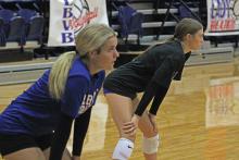 (ALEX HAVARDANSKY | THE GRAHAM LEADER) Kaden Atwood and Katy McGehee prepare to return a serve Saturday, Aug. 9. Both of these players will serve as veteran leaders on the team going into the year.