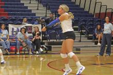(ALEX HAVARDANSKY | THE GRAHAM LEADER) Kaden Atwood sets a ball for the Lady Blues in a previous match. Atwood continued to hold down the fort defensively for the Lady Blues against Memorial High School with 12 digs.
