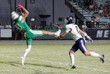 (ASHLEY ANDERSON | JACKSBORO-HERALD GAZETTE) Keegen Voyles falls backwards into the endzone Friday, Oct. 10 against Perrin-Whitt. Voyles was a playmaker defensively in the Bobcats win. 