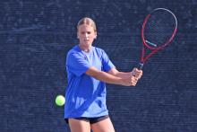 (ALEX HAVARDANKSY | THE GRAHAM LEADER) Kline Krupp aims for a ball Tuesday, Sept. 16, against Vernon in district play. The team of Krupp and Jade Dospapas put up the best fight in doubles play on the day losing narrowly 8-6. 