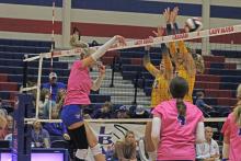 (ALEX HAVARDANKSY | THE GRAHAM LEADER) Kya Cooper swats at the ball for a kill attempt Tuesday, Oct. 21 against the Brock Lady Eagles. The Lady Blues lost to Brock in three sets. 