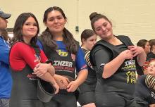 (GRAHAM HIGH SCHOOL | CONTRIBUTED PHOTO) Three Lady Blues competitors traveled Tuesday, Feb. 25 to compete in the regional powerlifting competition in Decatur. Shown from left to right are Lady Blues lifters Hope Jones, Hailey Martinez and Laney Herring during the qualifying meet Thursday, Feb. 13 in Weatherford.
