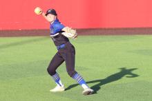 (THOMAS WALLNER | THE GRAHAM LEADER) Jansyn Louder throws the ball in from left field during the Lady Blues' 11-1 loss Tuesday, March 24, on Hogan Field.
