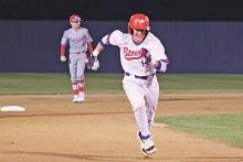 (FILE PHOTO | THE GRAHAM LEADER) Tate Loesch runs to third base during the first inning of the Steers’ 10-8 home loss Thursday, March 16 to Glen Rose. Loesch recently earned Second Team All-District Infield.