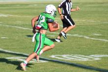 (ALEX HAVARDANSKY | THE GRAHAM LEADER) Mikey Soito breaks free down field for a receiving touchdown Friday, Aug. 22. Soito produced three touchdowns on the day.