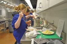 (THOMAS WALLNER | THE GRAHAM LEADER) Caty Rexroad (left) and Shellbee Howell work as a team on a baked potato soup as a part of the Culinary Arts program with North Central Texas College.