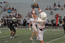 (ALEX HAVARDANKSY | THE GRAHAM LEADER) Parker Hale catches a slant pass for the Steers in their scrimmage match Friday, Aug. 15. Hale emerged as an elusive option for the team in the receiving game.