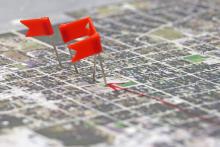 (THOMAS WALLNER | THE GRAHAM LEADER) Residents marked areas of localized flooding on a map at a town hall in November 2025 regarding the city of Graham’s in-progress comprehensive plan. The city will host another public meeting where the public can provide input Thursday, May 28.