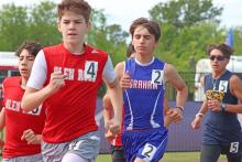 (THOMAS WALLNER | THE GRAHAM LEADER) Dayne Dunnam runs in the 3200-Meter Run at the district track meet Wednesday, April 8 at Newton Field in Graham.