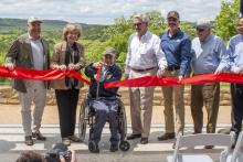 (TPWD | CONTRIBUTED PHOTO) Governor Greg Abbott, Secretary of State Jane Nelson, Texas Parks and Wildlife Department Executive Director David Yoskowitz and others cut a ribbon Friday, April 10 for the grand opening of Palo Pinto Mountains State Park.