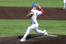 (ALEX HAVARDANSKY | THE GRAHAM LEADER) Ayden McDougal throws a pitch during the Steers hometown tournament Friday, March 6. The Steers pitching was locked in all tournament. 