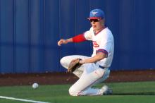 (THOMAS WALLNER | THE GRAHAM LEADER) Ayden McDougal slides to catch a hit to left field by the Brock Eagles during their first matchup against the Steers at home Tuesday, March 24. The team took on the Eagles again Friday, March 27 and fell 10-0.