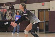 (ALEX HAVARDANSKY | THE GRAHAM LEADER) Tara Dawson lines up in the back row Tuesday, Sept. 9 against the Bowie Lady Rabbits. Dawson has come back from injury this season to be a leader both on and off the court. 