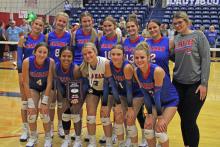 (ALEX HAVARDANSKY | THE GRAHAM LEADER) The Lady Blues pose for a photo Saturday, Aug. 23, after the Lu Allen Memorial Volleyball Tournament. The team took home third place while Kaden Atwood was nominated to the all tournament team.