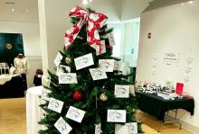 (OPOMAC | CONTRIBUTED PHOTO) An Elder Angel Tree on display at Smart Graphics in Graham. Angels are available for adoption at both the Old Post Office Museum and Art Center and Smart Graphics in Graham to provide gifts for seniors in the community.