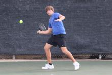 (ALEX HAVARDANKSY | THE GRAHAM LEADER) Tyler Bryan prepares to swing at a ball during one of his singles matches. Bryan has been a consistent power hitter for the Steers this season and won his singles match Tuesday, Sept. 30, against Holliday. 