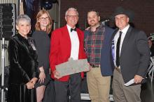 (THOMAS WALLNER | THE GRAHAM LEADER) The Volunteer of the Year award was presented to Brad Partridge during the 2025 Grahammy Awards. Shown from left to right are Graham Chamber of Commerce CEO Cathy Partridge, Graham Chamber of Commerce Executive Director Cayley Strickland, Brad Partridge, Chamber Executive Committee Chair Mason Shierry and Chance Condron.