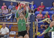 (ASHLEY ANDERSON | JACKSBORO-HERALD GAZETTE) Camren Mallory sets up a pass for the Ladycats Tuesday, Oct. 14. The Ladycats swept the Bryson Cowgirls in three sets during this district match. 