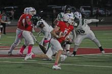 (ALEX HAVARDANSKY | THE GRAHAM LEADER) Jace Gill runs out of the pocket for the Steers on a rushing play Friday, Sept. 26. Gill has been the one manning the quarterback position after four year starter Ty Thompson graduated last spring.