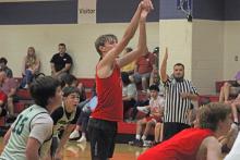 (ALEX HAVARDANKSY | THE GRAHAM LEADER) Jaden Neal attempts a free throw shot Monday, Oct. 6, in Graham’s fall league basketball league. The team bounced back from their Saturday shootout and defeated Wichita Falls Christian and Breckenridge.