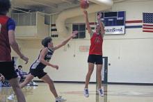 (ALEX HAVARDANSKY | THE GRAHAM LEADER) Jagger Nees attempts a three pointer during one of the Steers fall league matchups. Nees had the second most points in the Steers scrimmage matchups Saturday, Nov. 8, with 11 points on the day.