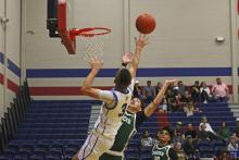 (ALEX HAVARDANKSY | THE GRAHAM LEADER) Jagger Nees puts up a floater in one of the Steers’ previous Matchups. Nees scored 11 points in Graham’s 78-22 win Tuesday, Dec. 2 against the Colorado City Wolves.