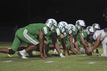 (ARCHIVE PHOTO | THE GRAHAM LEADER) The Newcastle Bobcats defense lines up against an opposing offense in a game earlier this season. The Bobcats defeated the Bryson Cowboys 54-6 in their last regular season game and advanced to the playoffs.
