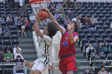 (TC GORDON | THE GRAHAM LEADER) The Steers’ Nikolas Wankowicz blocks a Breckenridge shot attempt near the rim Monday, Nov. 25 late in the game of Graham’s 49-45 loss to the Buckaroos.